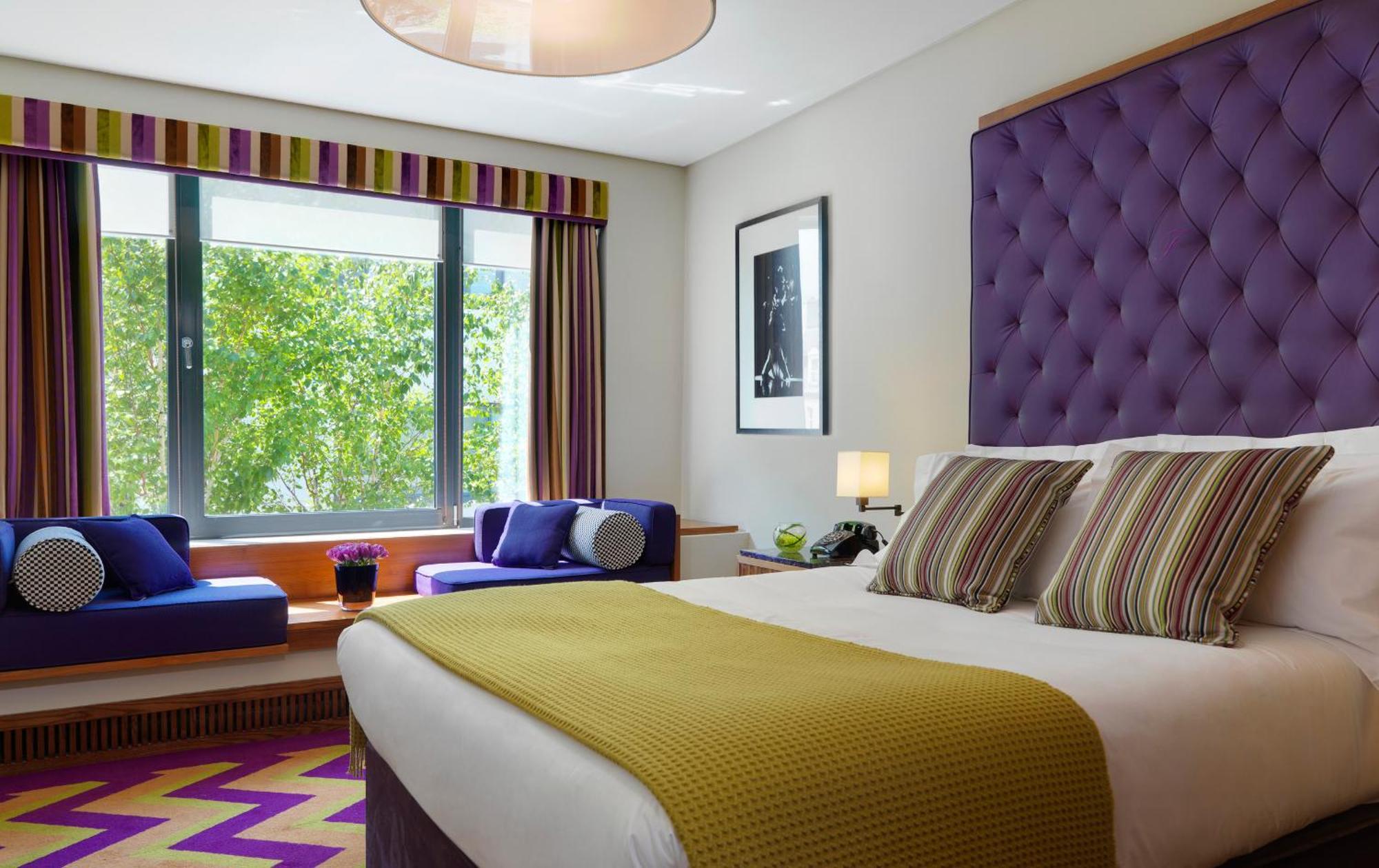 The Fitzwilliam Hotel Dublin Dış mekan fotoğraf A bedroom at the Hilton London Paddington
